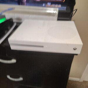 Xbox one s, 29 games, and 2 controllers